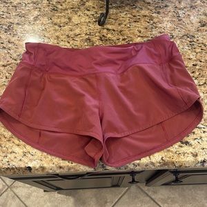 These are Lululeamon, Speed up, Maroon, 2.5 inch inseam, size 6, shorts.